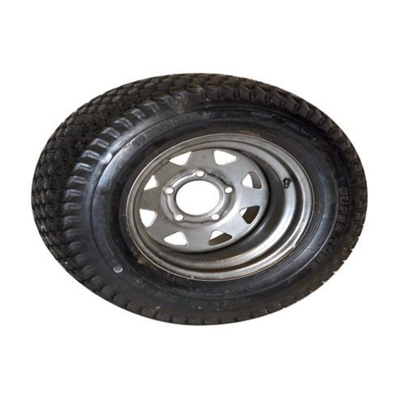 New, Old Stock 10.5" x 23" 5 Bolt Tire and Wheel Assembly
